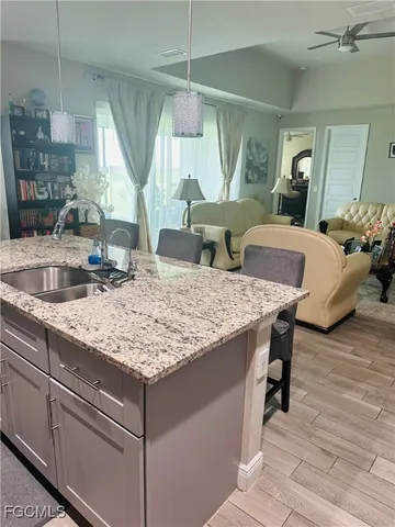 a dining table with chairs and window