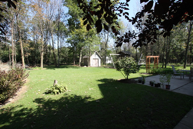 415 Rivers Edge Drive Minooka, IL 60447 - Photo 22 of 24 a view of a park with large trees