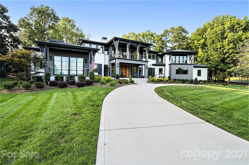 19053 Double Eagle Drive Cornelius, NC 28031 - Photo 2 of 43 a front view of a house with a yard