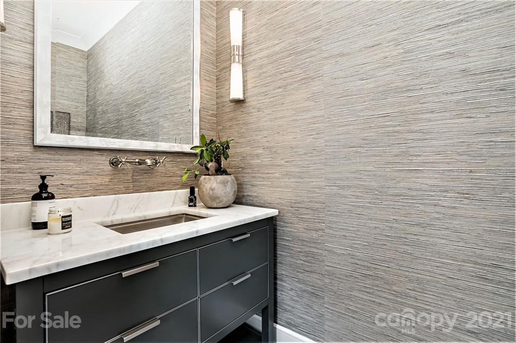 19053 Double Eagle Drive Cornelius, NC 28031 - Photo 19 of 43 a bathroom with a sink and a mirror