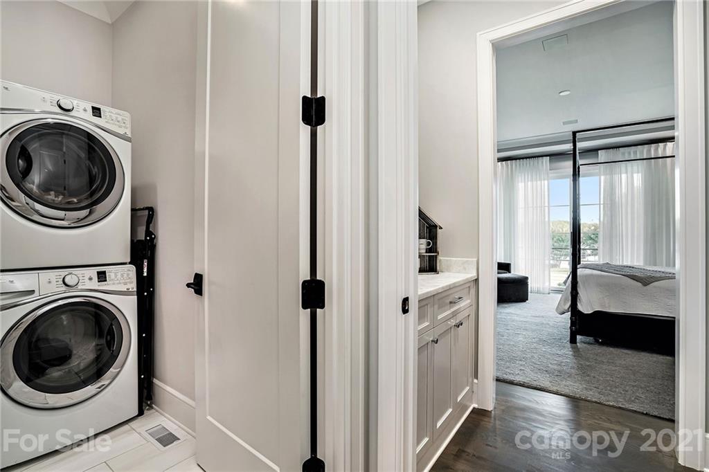 19053 Double Eagle Drive Cornelius, NC 28031 - Photo 25 of 43 a view of a hallway with washer and dryer