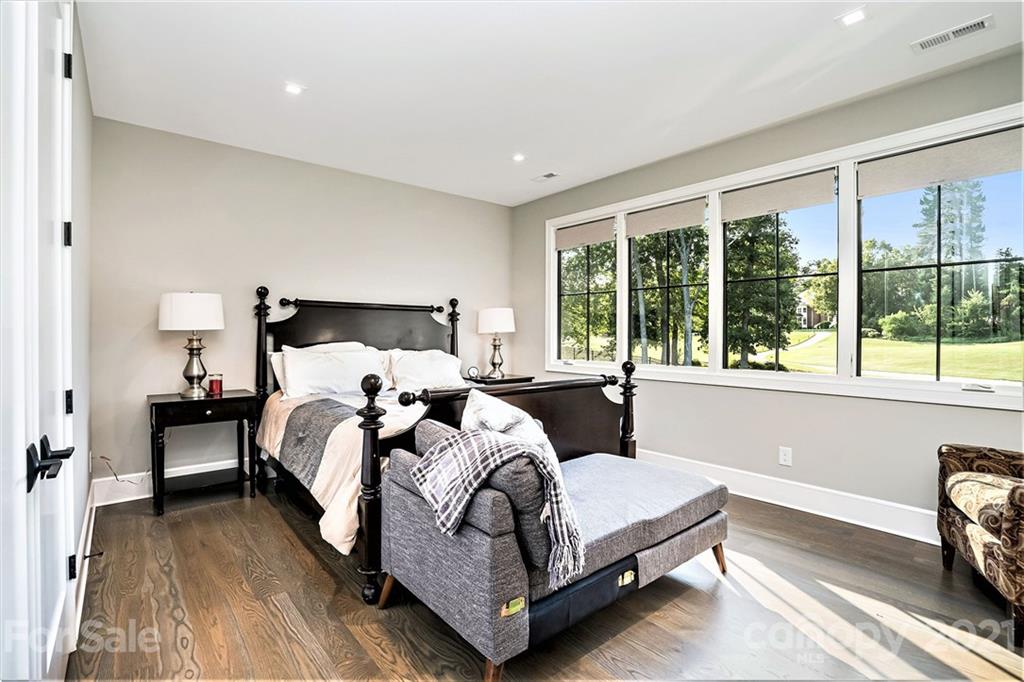 19053 Double Eagle Drive Cornelius, NC 28031 - Photo 28 of 43 a bedroom with bed and a large window