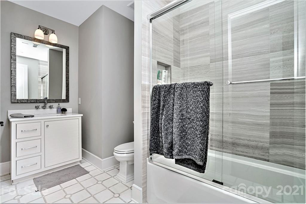 19053 Double Eagle Drive Cornelius, NC 28031 - Photo 29 of 43 a bathroom with a granite countertop sink toilet and shower