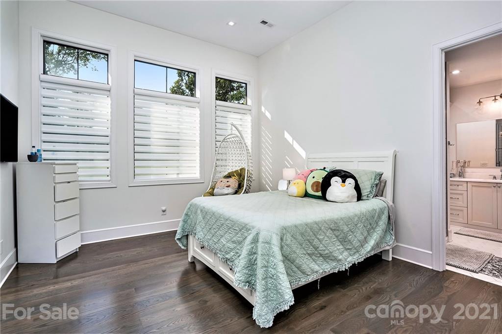 19053 Double Eagle Drive Cornelius, NC 28031 - Photo 30 of 43 a bedroom with a bed and a window