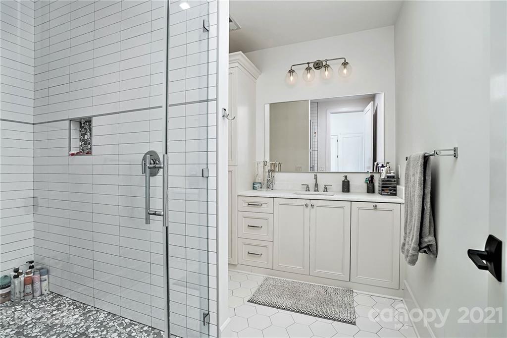 19053 Double Eagle Drive Cornelius, NC 28031 - Photo 31 of 43 a bathroom with a shower