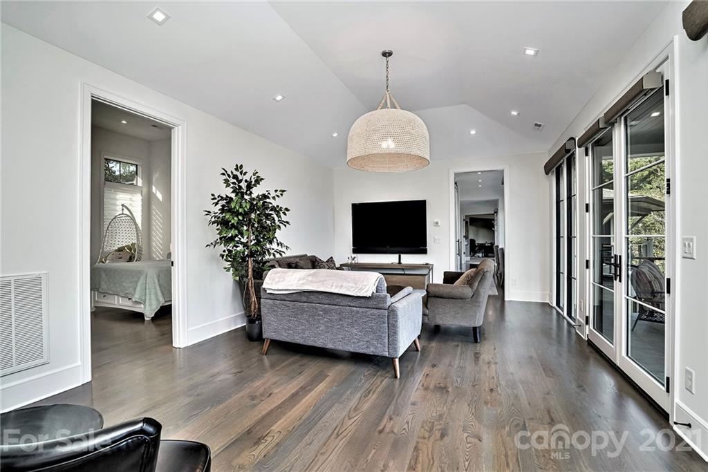 19053 Double Eagle Drive Cornelius, NC 28031 - Photo 33 of 43 a living room with furniture and a flat screen tv