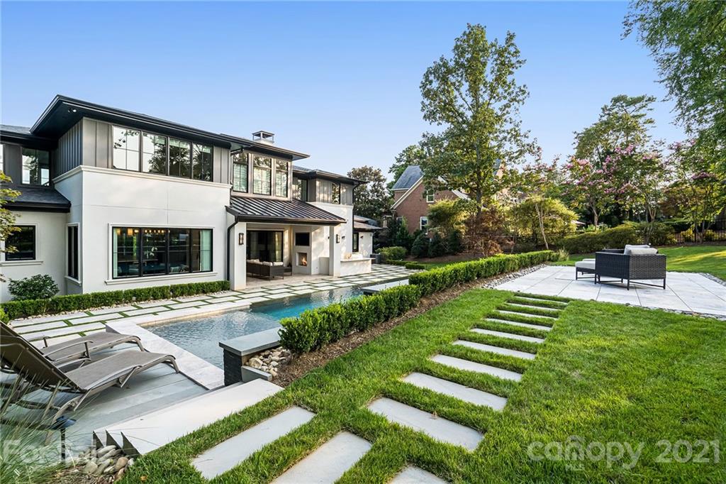 19053 Double Eagle Drive Cornelius, NC 28031 - Photo 39 of 43 a front view of a house with a yard table and chairs