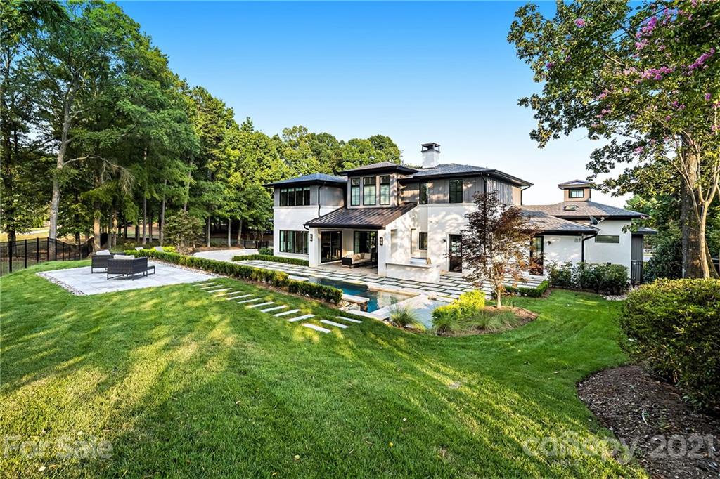 19053 Double Eagle Drive Cornelius, NC 28031 - Photo 40 of 43 a front view of a house with garden