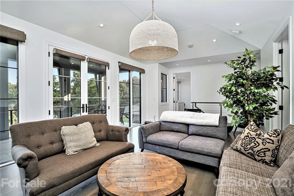 19053 Double Eagle Drive Cornelius, NC 28031 - Photo 5 of 43 a living room with furniture and a large window