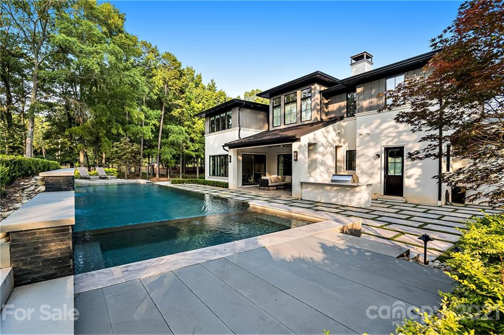 19053 Double Eagle Drive Cornelius, NC 28031 - Photo 41 of 43 a view of a white building with a swimming pool