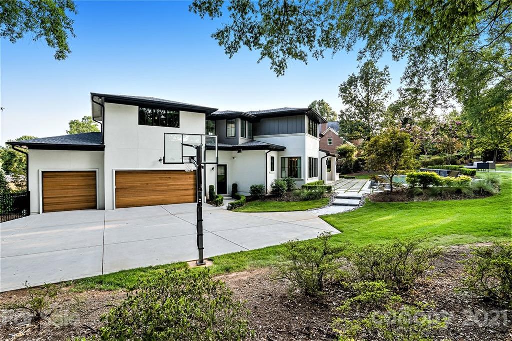 19053 Double Eagle Drive Cornelius, NC 28031 - Photo 42 of 43 a front view of a house with garden