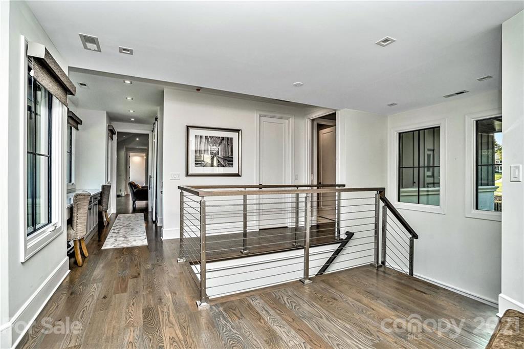19053 Double Eagle Drive Cornelius, NC 28031 - Photo 6 of 43 a view of entryway and hall with wooden floor