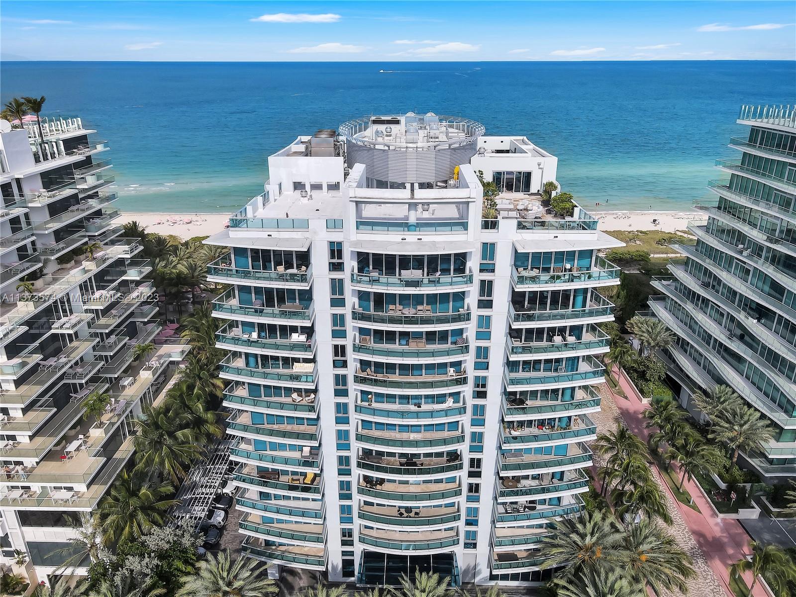 9401 Collins Avenue, Unit 402 Surfside, FL 33154 - Photo 17 of 31 a view of a building with glass windows