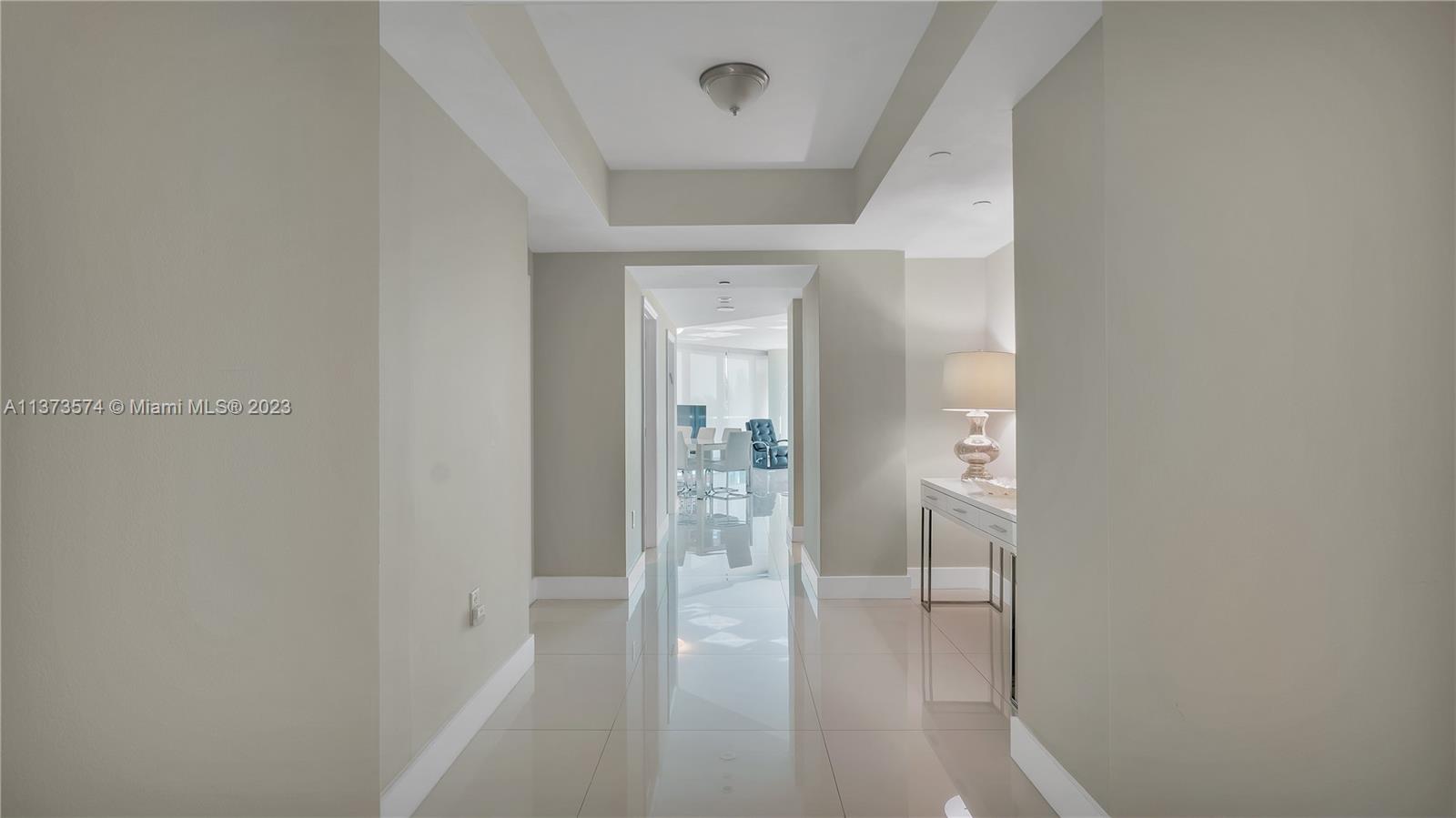 9401 Collins Avenue, Unit 402 Surfside, FL 33154 - Photo 26 of 31 a view of a hallway