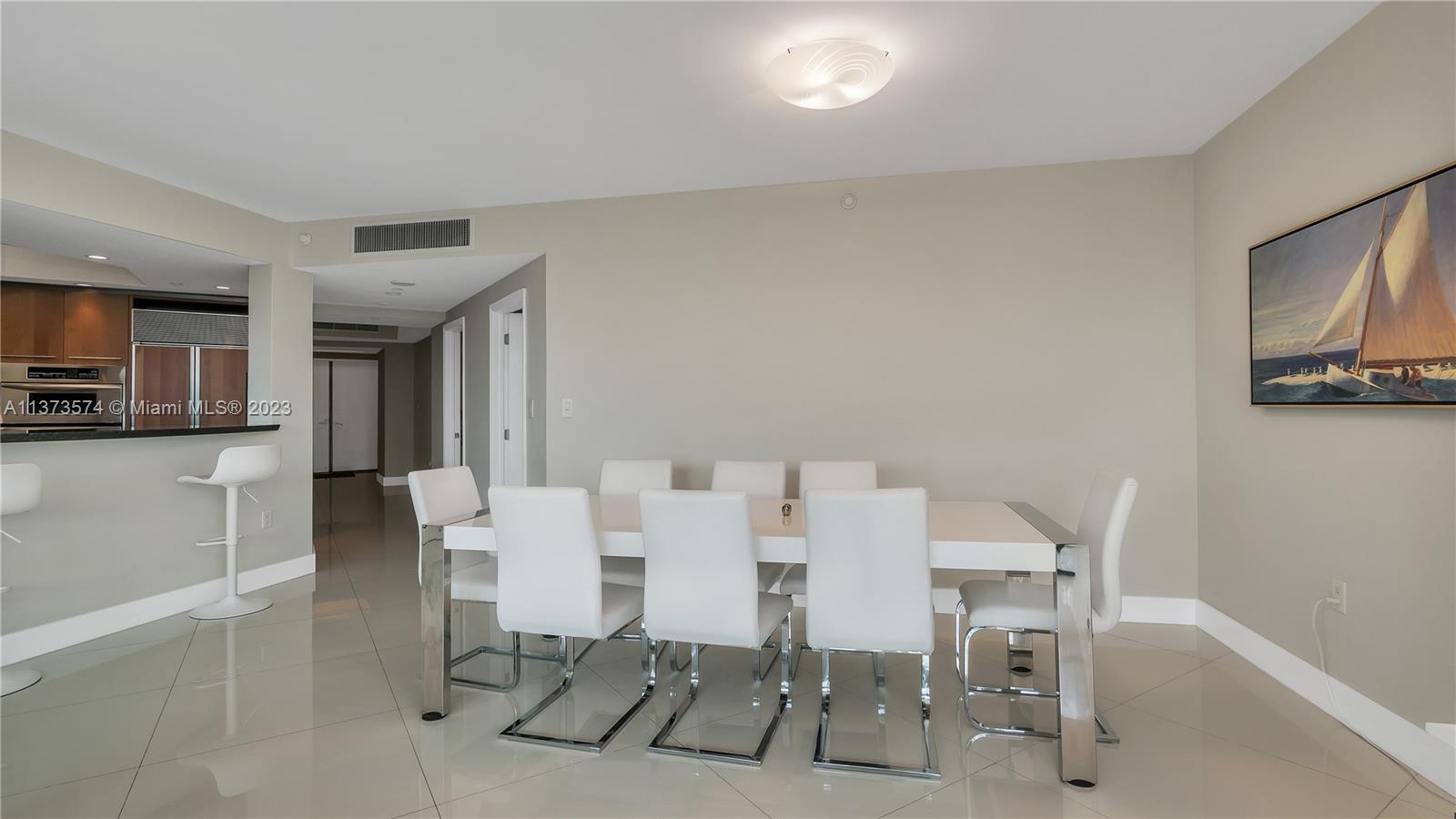 9401 Collins Avenue, Unit 402 Surfside, FL 33154 - Photo 27 of 31 a view of kitchen with breakfast area