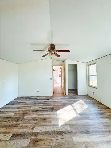 a view of a lake with a yard