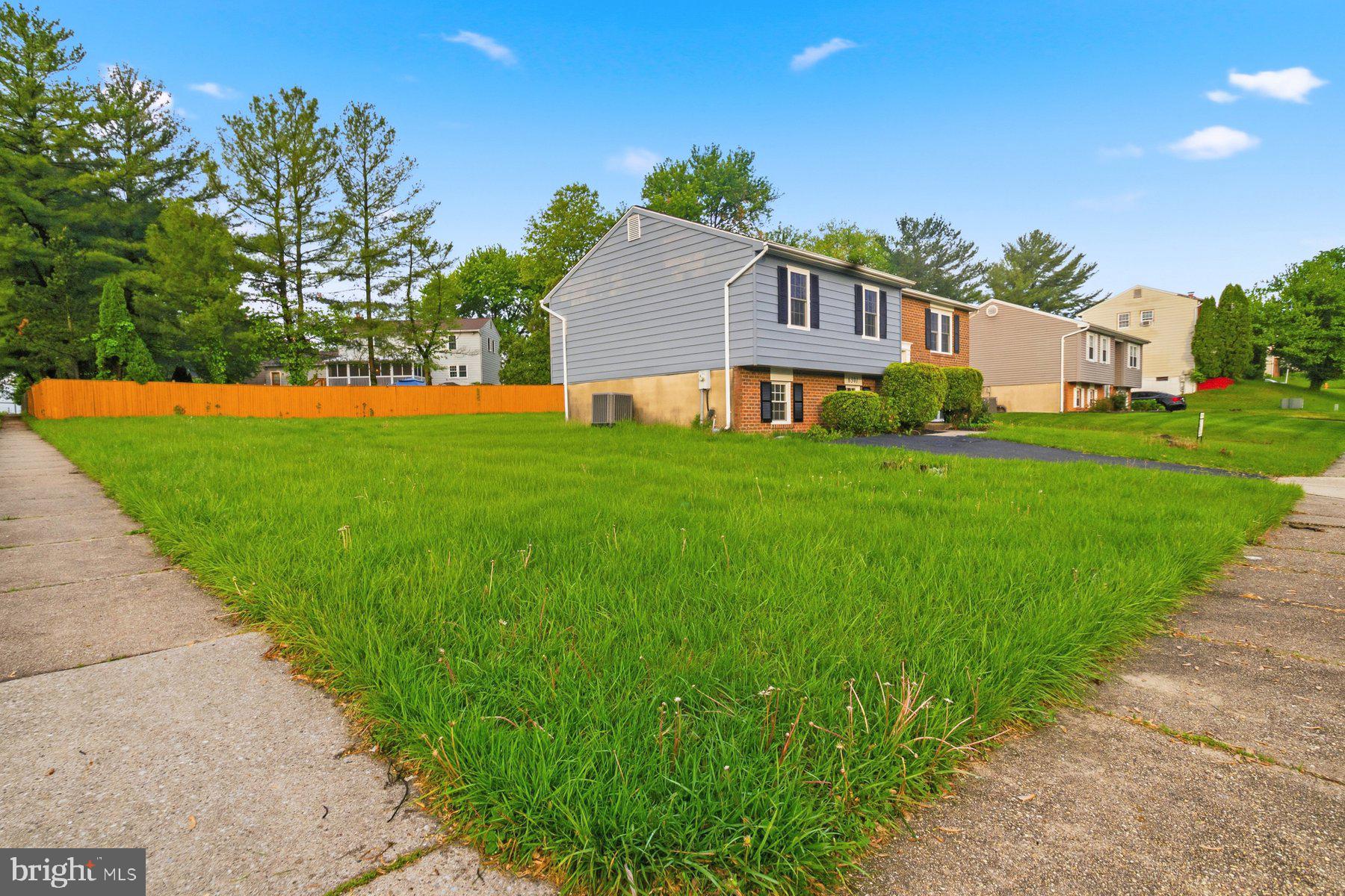 6301 Linus Drive Baltimore, MD 21207 - Photo 2 of 38 a house view with a garden space