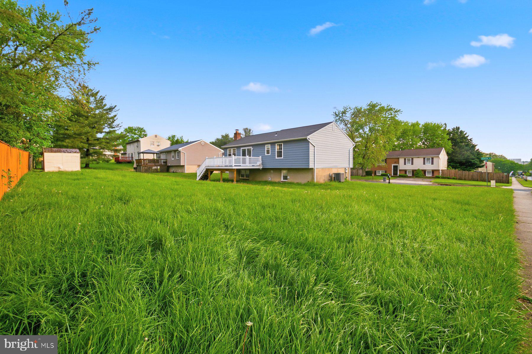 6301 Linus Drive Baltimore, MD 21207 - Photo 3 of 38 a house view with a garden space
