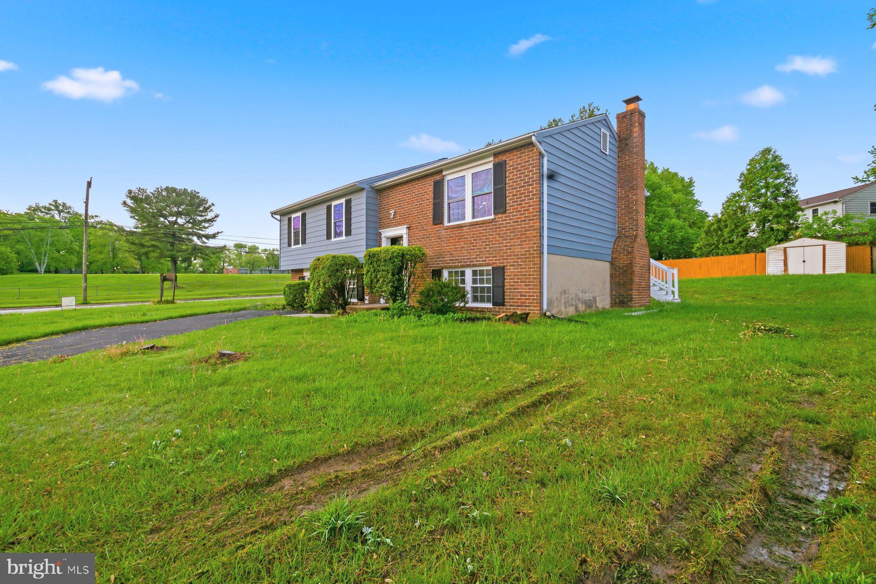 6301 Linus Drive Baltimore, MD 21207 - Photo 6 of 38 a view of a house with a yard