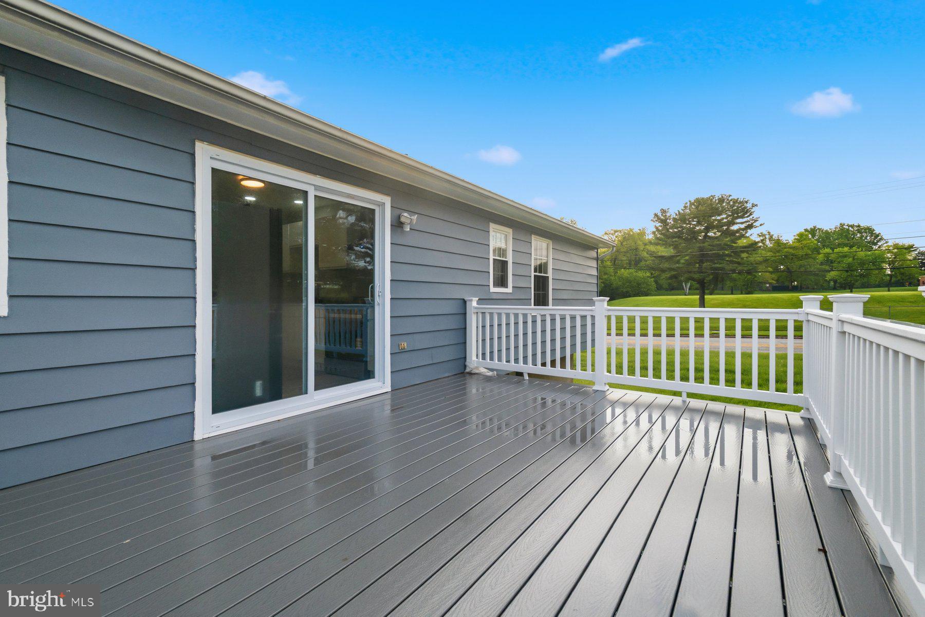 6301 Linus Drive Baltimore, MD 21207 - Photo 10 of 38 a view of deck with wooden floor and fence