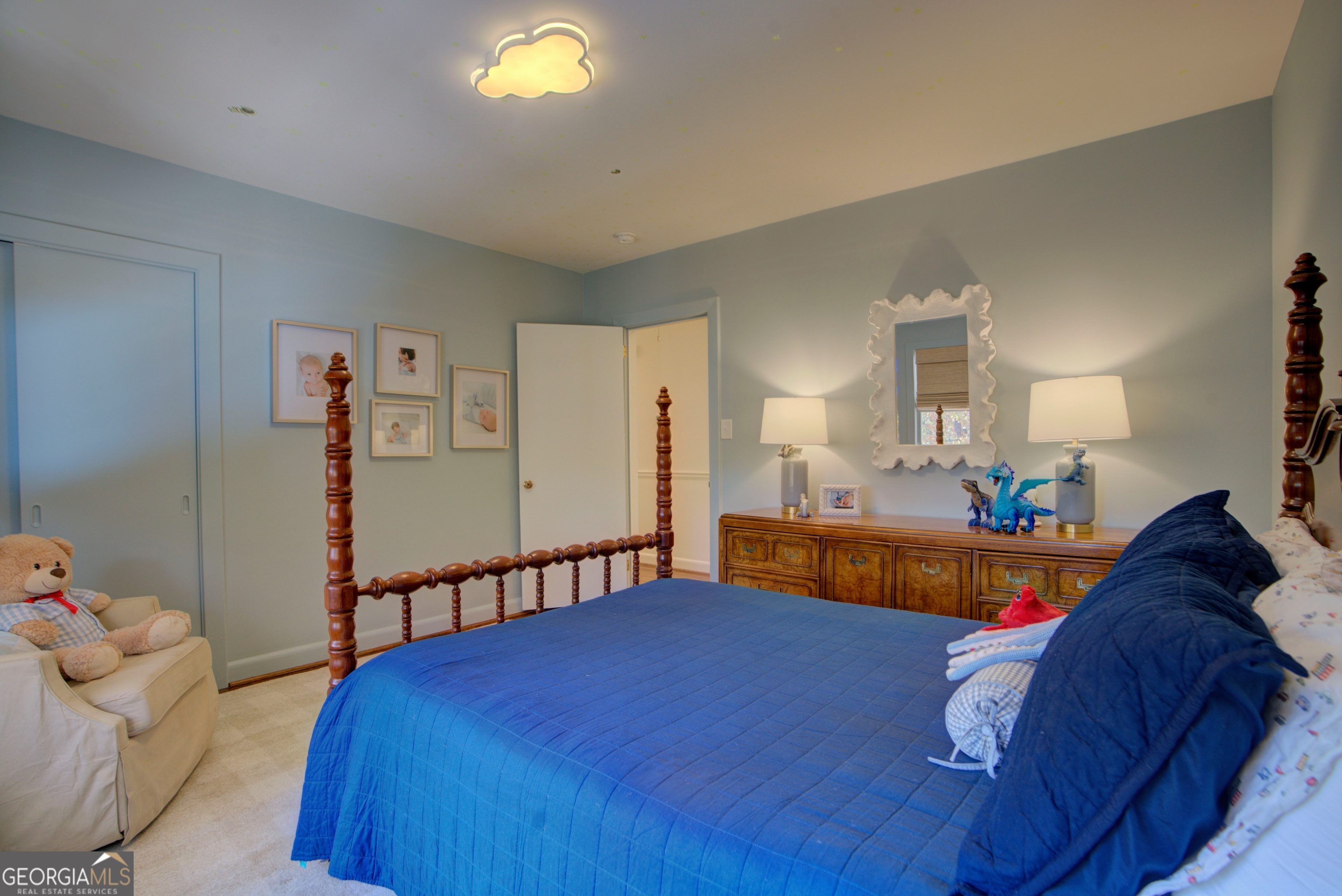 17 Crestwood Drive Rome, GA 30165 - Photo 16 of 36 a bedroom with a bed and a chandelier