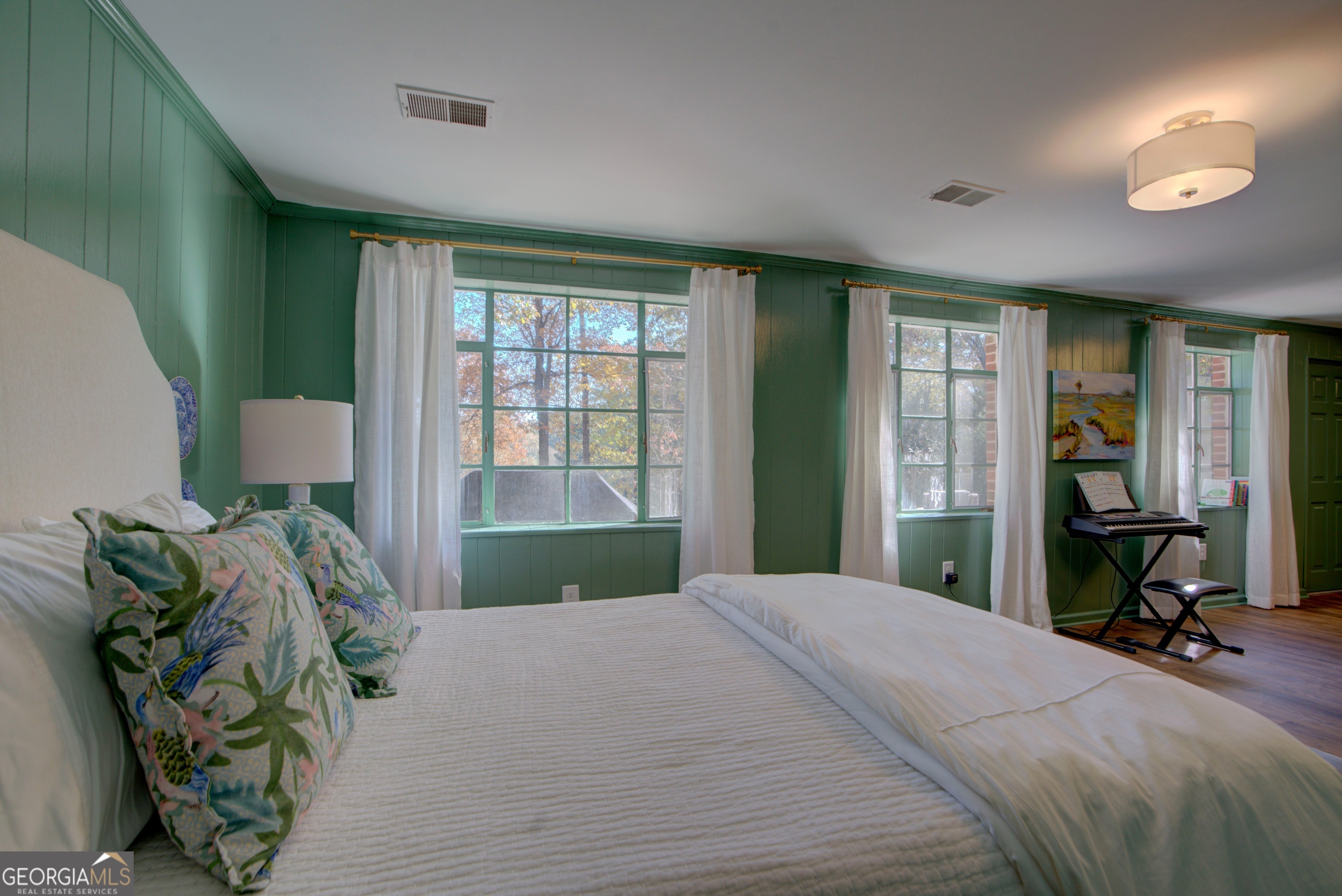 17 Crestwood Drive Rome, GA 30165 - Photo 19 of 36 a bedroom with a bed table and a window