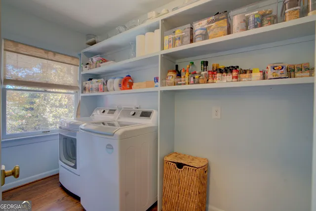 a utility room with dryer and washer