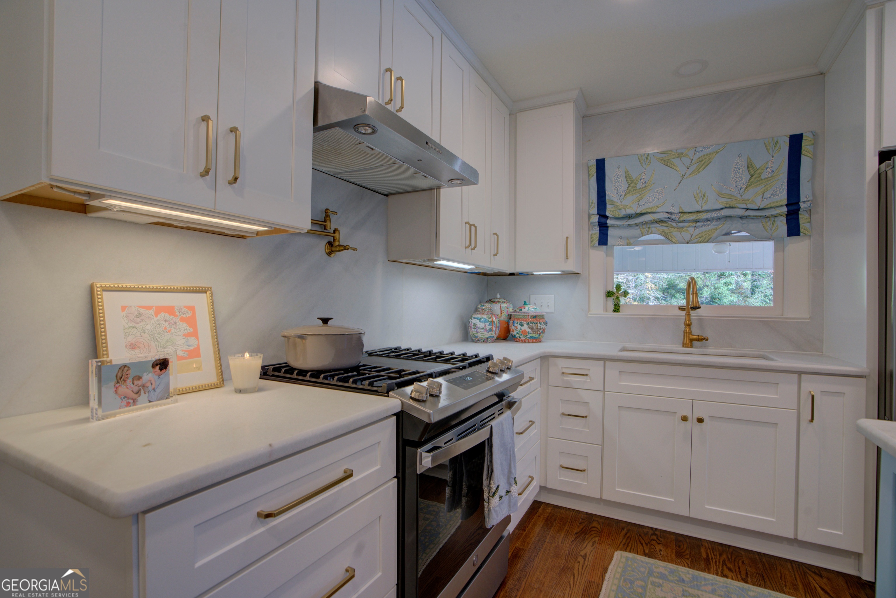 17 Crestwood Drive Rome, GA 30165 - Photo 6 of 36 a kitchen with cabinets appliances a sink and a window