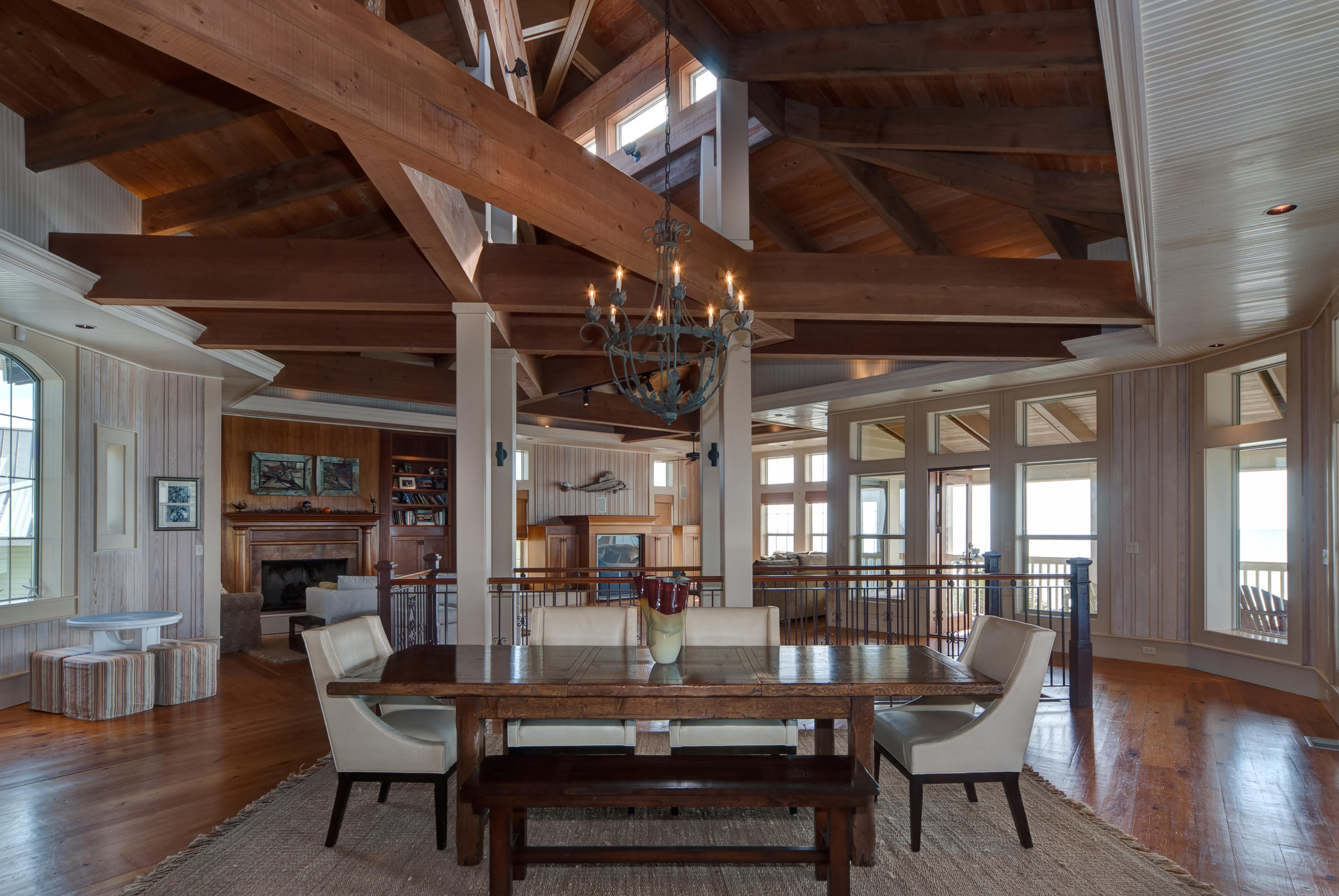 491 Old Beach Road Santa Rosa Beach, FL 32459 - Photo 11 of 36 a dining room with furniture and wooden floor