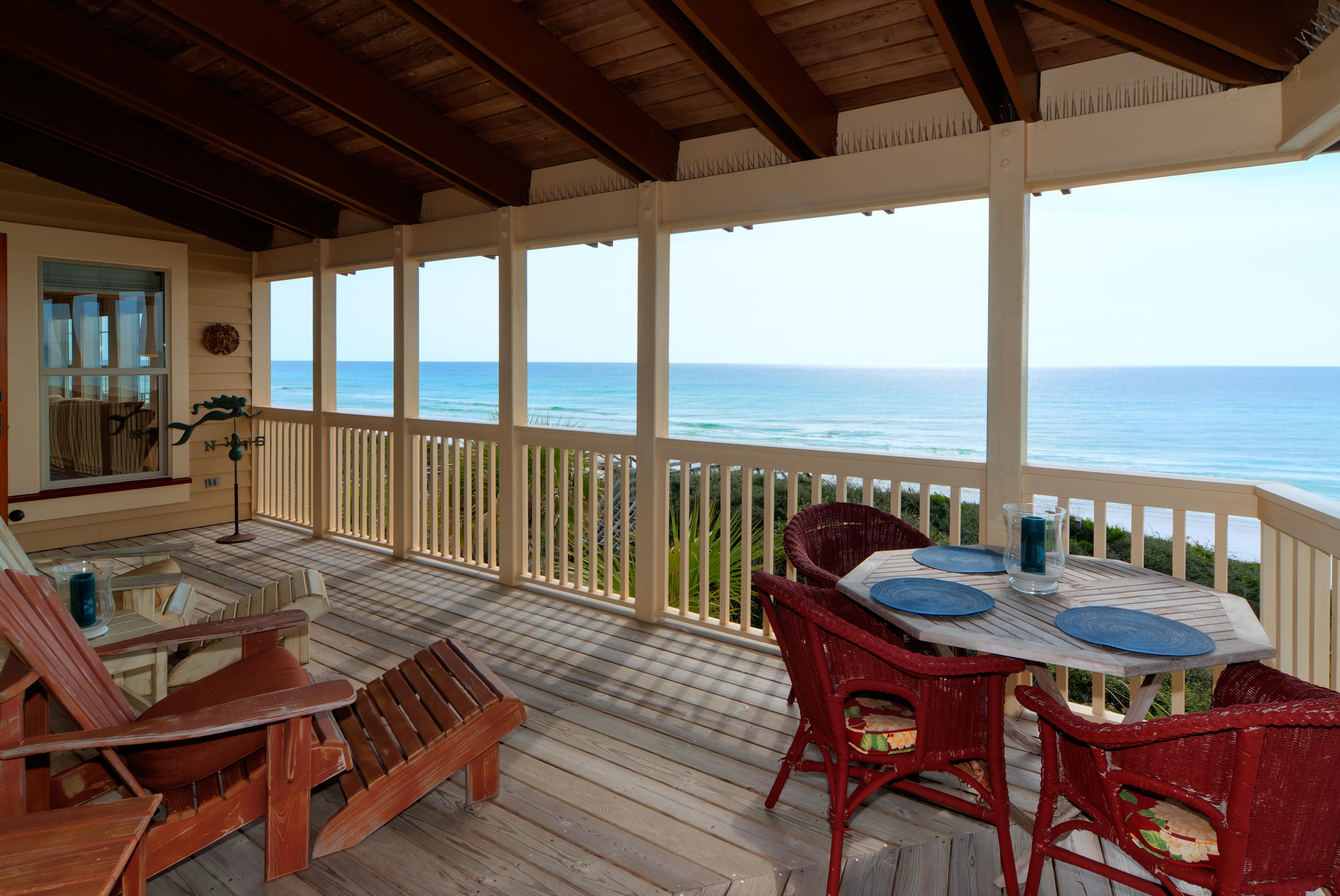 491 Old Beach Road Santa Rosa Beach, FL 32459 - Photo 18 of 36 a view of a dining room with furniture window and wooden floor