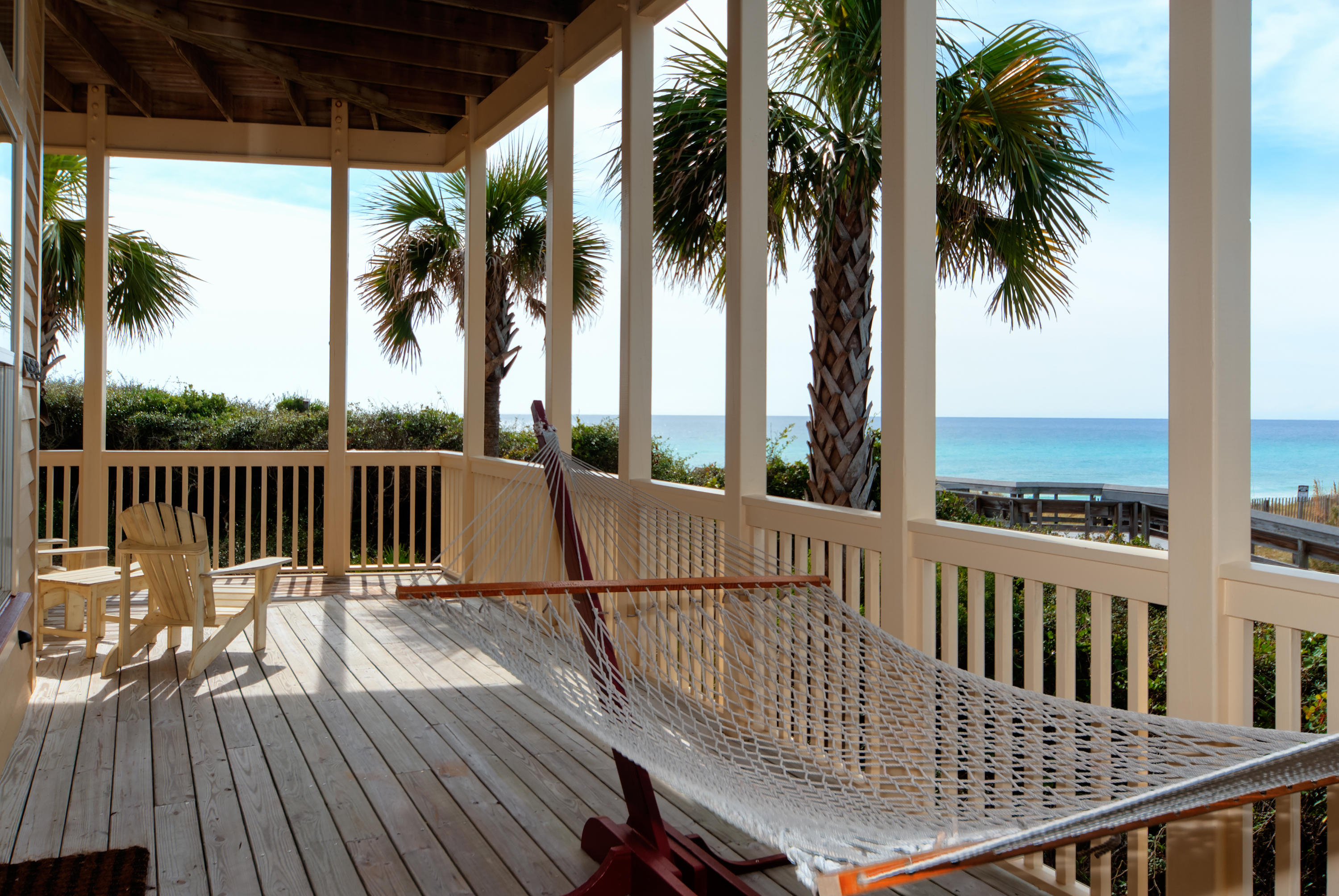 491 Old Beach Road Santa Rosa Beach, FL 32459 - Photo 3 of 36 a view of balcony with furniture and wooden floor