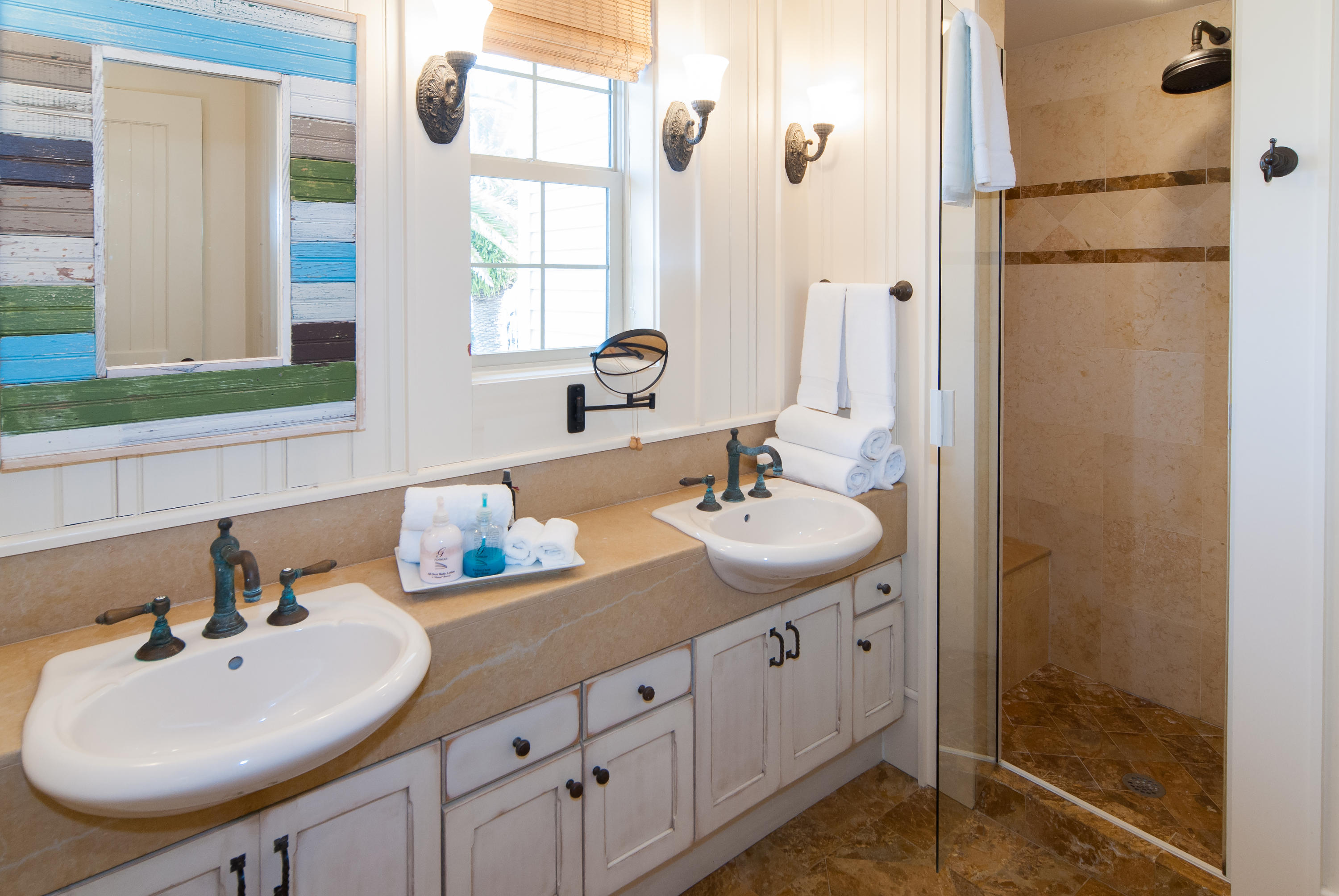 491 Old Beach Road Santa Rosa Beach, FL 32459 - Photo 22 of 36 a bathroom with a sink and a mirror