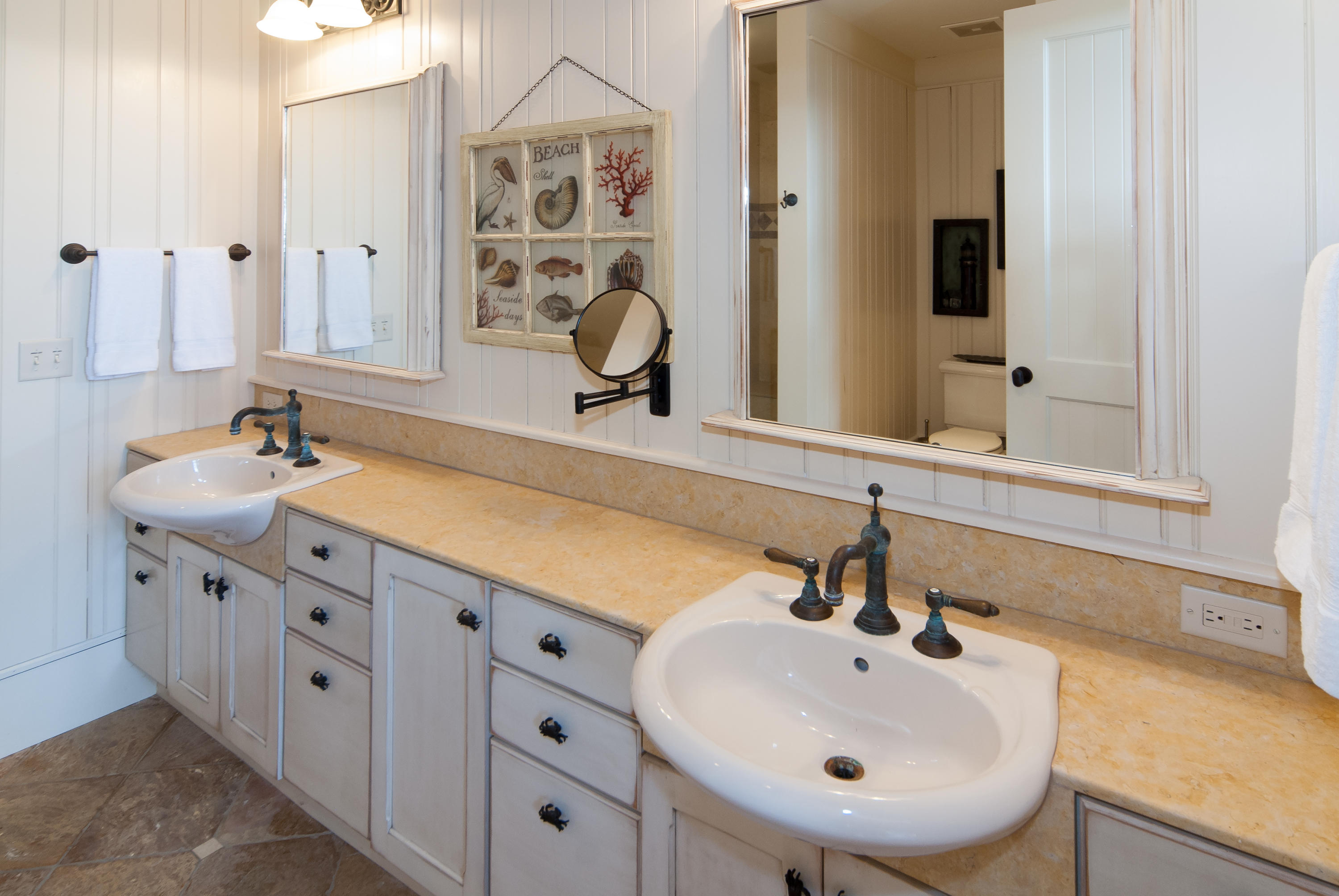 491 Old Beach Road Santa Rosa Beach, FL 32459 - Photo 33 of 36 a bathroom with double sink and a mirror