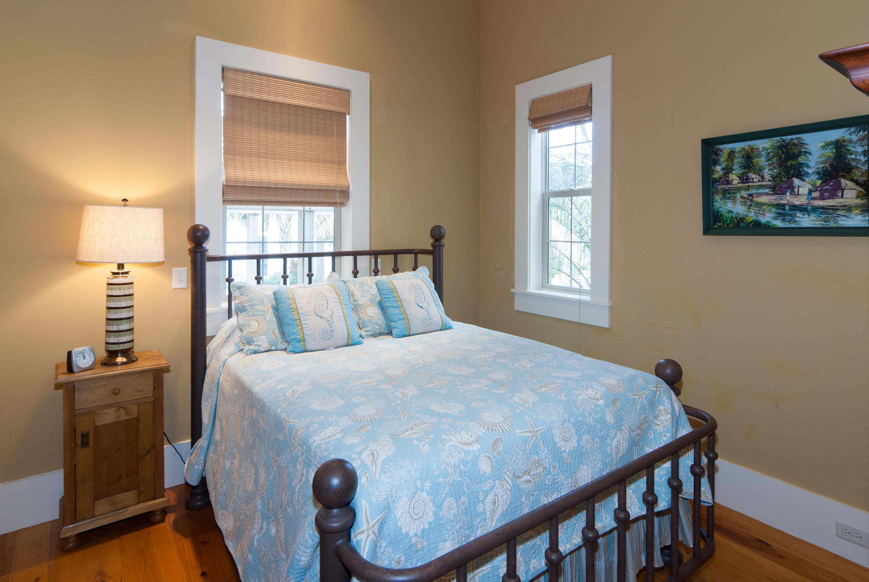 491 Old Beach Road Santa Rosa Beach, FL 32459 - Photo 34 of 36 a bed sitting in a bedroom next to a window