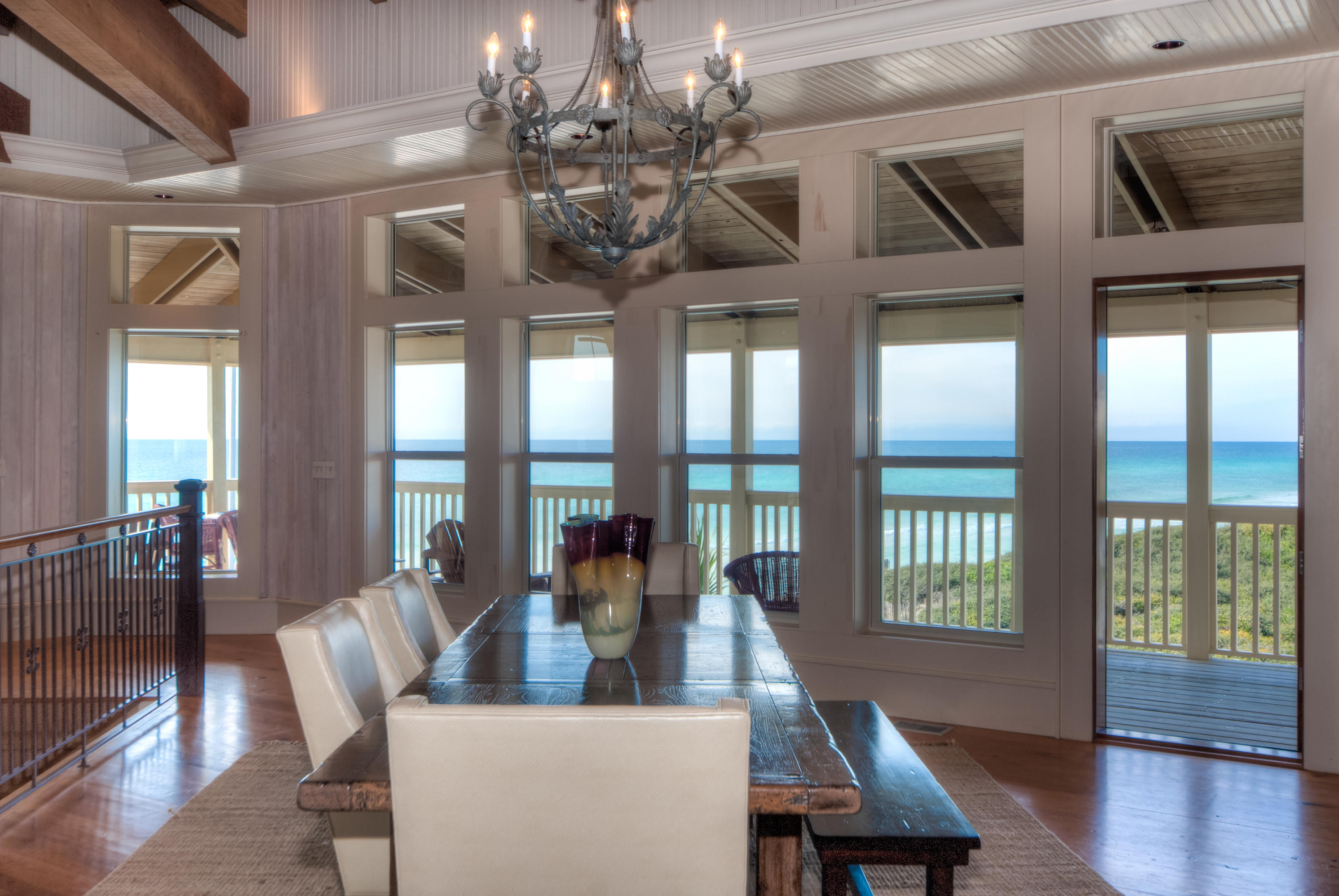 491 Old Beach Road Santa Rosa Beach, FL 32459 - Photo 6 of 36 a view of a dining room with furniture window and wooden floor