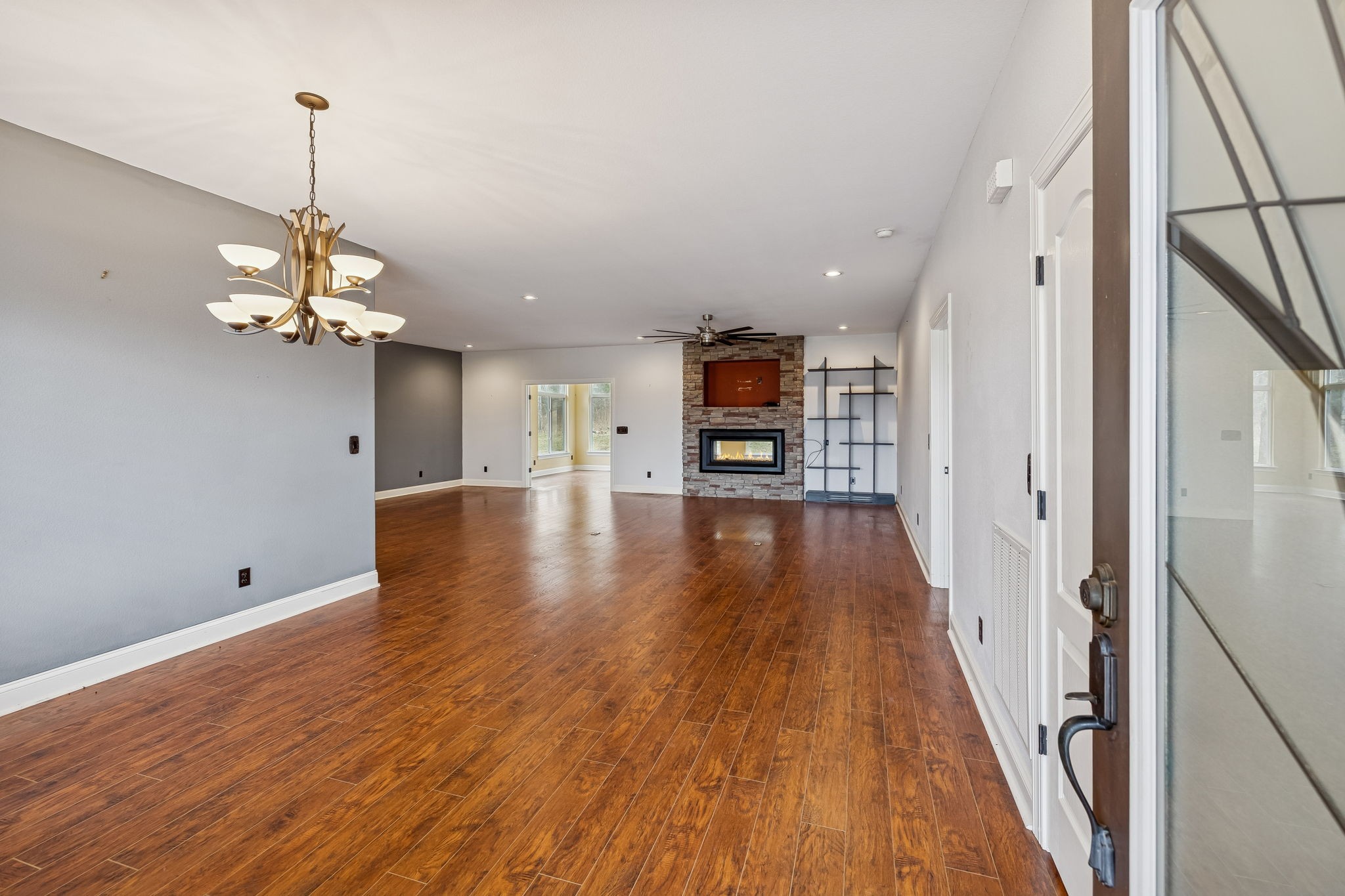 1970 Corinth Road Mount Juliet, TN 37122 - Photo 26 of 71 a view of a room with wooden floor a ceiling fan and windows