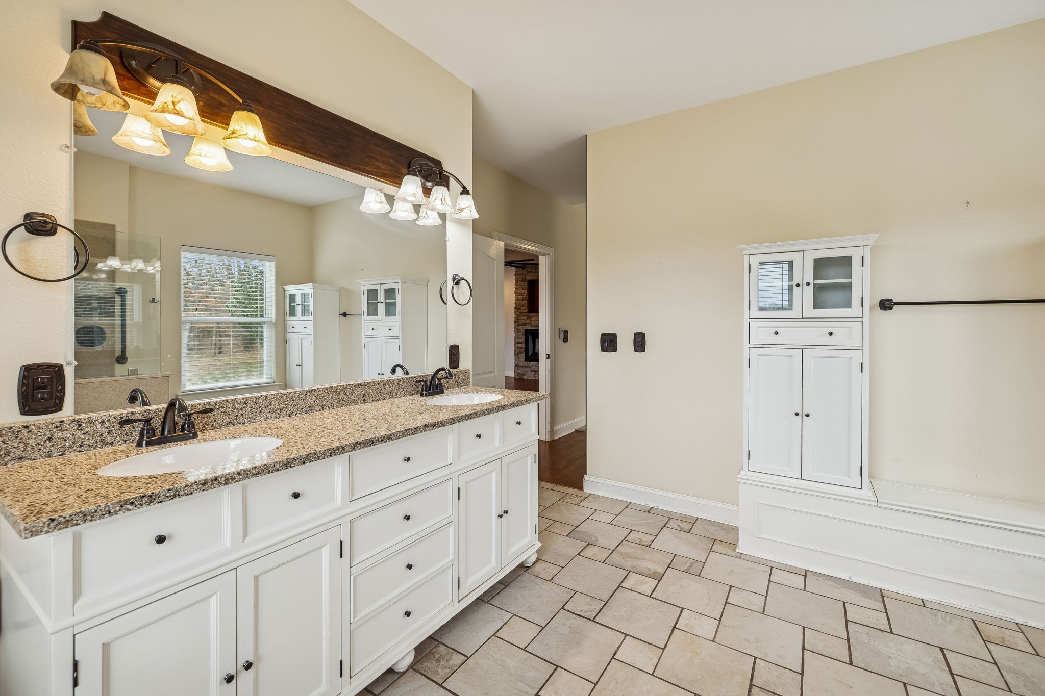 1970 Corinth Road Mount Juliet, TN 37122 - Photo 39 of 71 a spacious bathroom with a granite countertop sink and a mirror