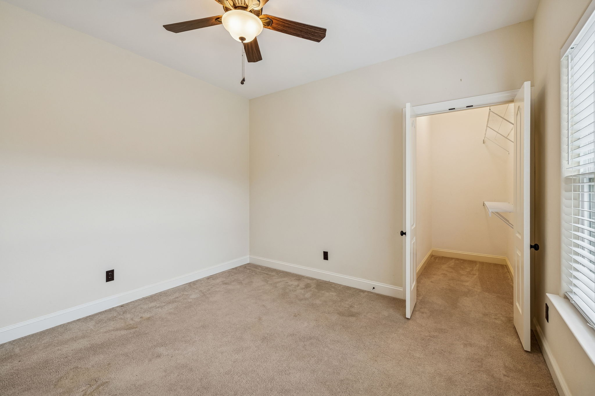 1970 Corinth Road Mount Juliet, TN 37122 - Photo 47 of 71 an empty room with a window and a ceiling fan