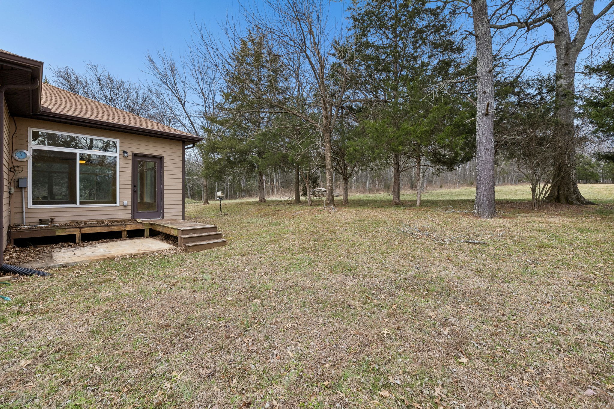 1970 Corinth Road Mount Juliet, TN 37122 - Photo 51 of 71 a view of a house with a backyard
