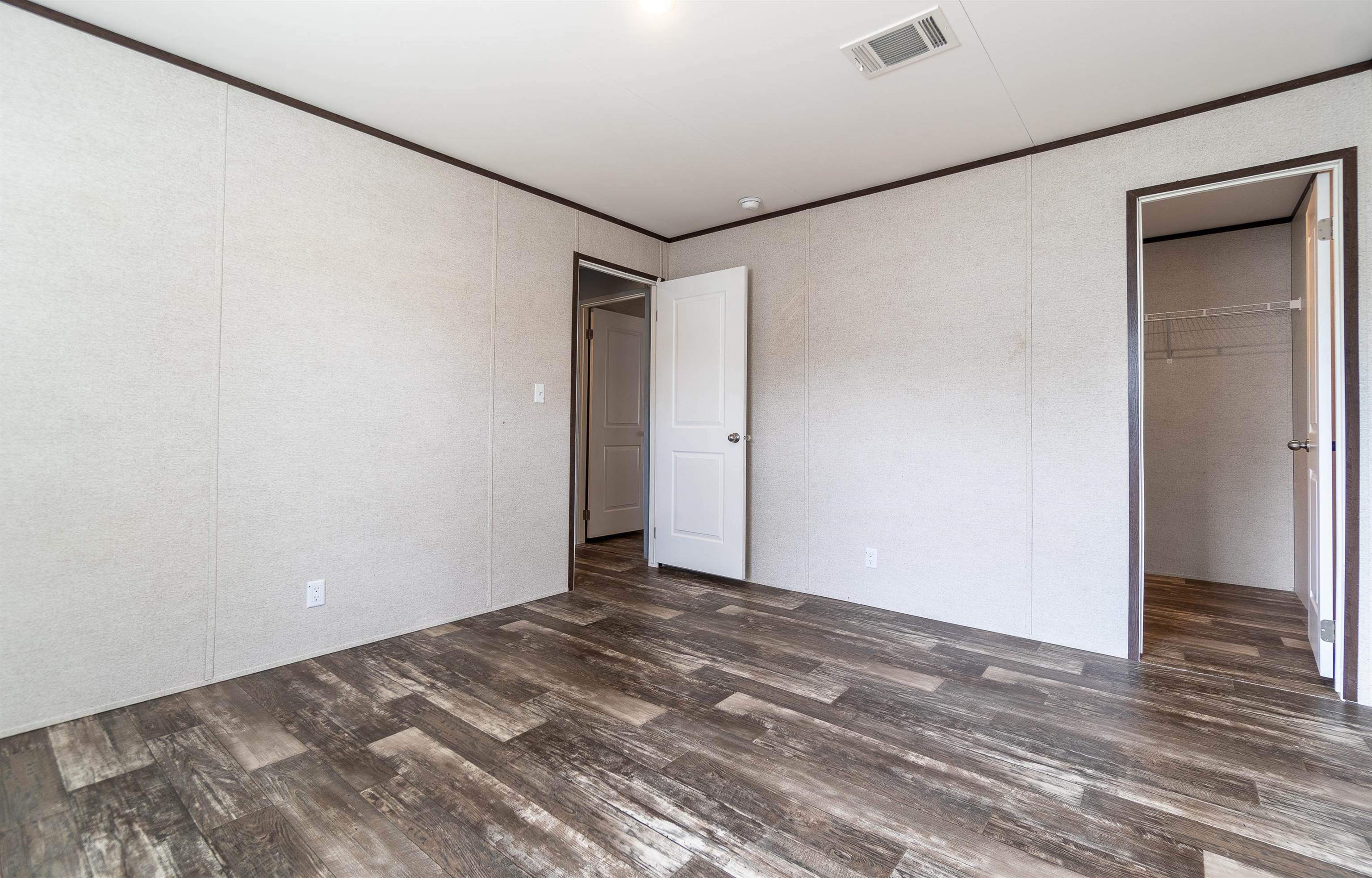 102 Pinelake Drive Satsuma, FL 32189 - Photo 15 of 35 a view of a room with wooden floor