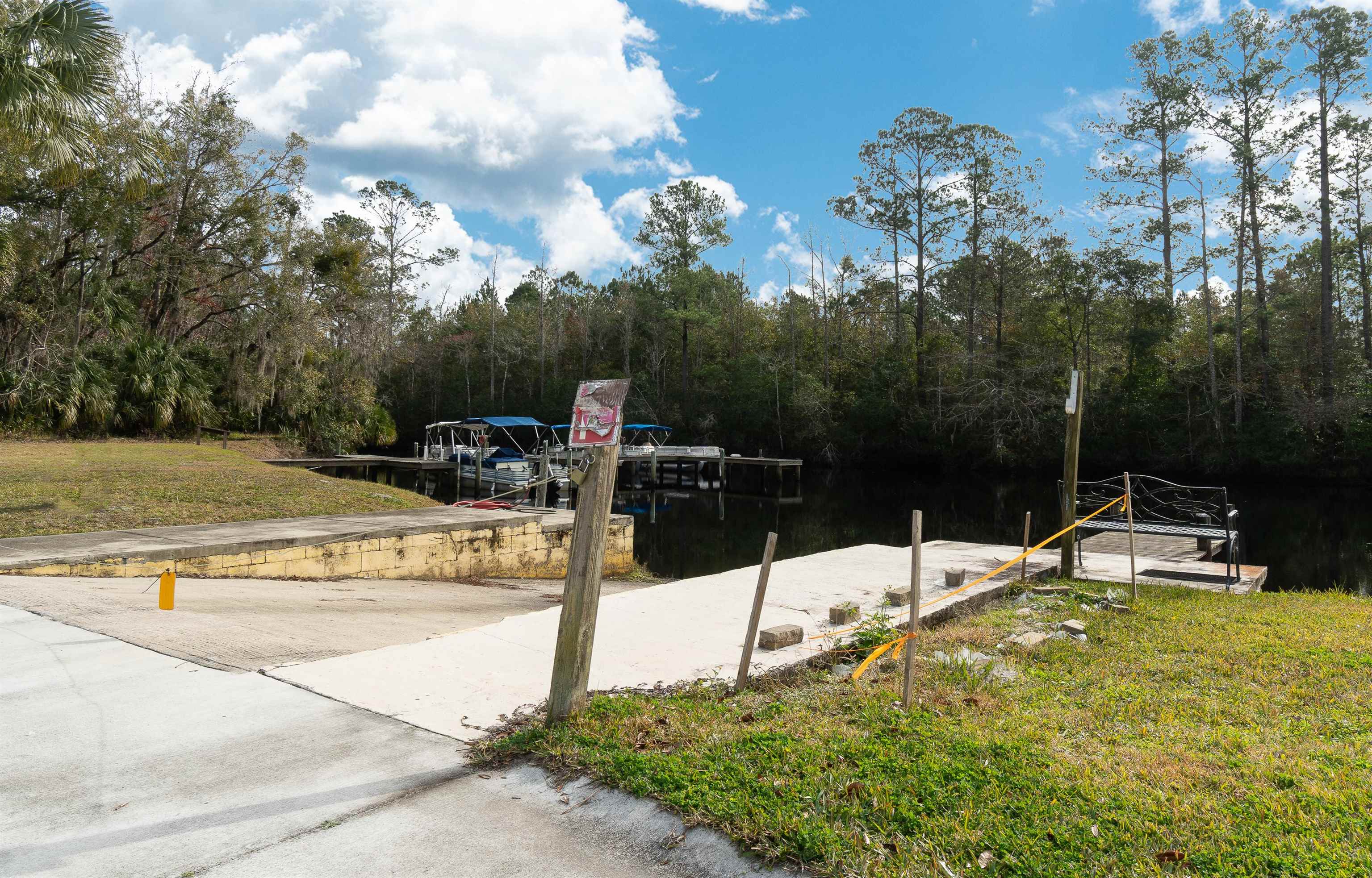 102 Pinelake Drive Satsuma, FL 32189 - Photo 25 of 35 a view of a swimming pool with a patio