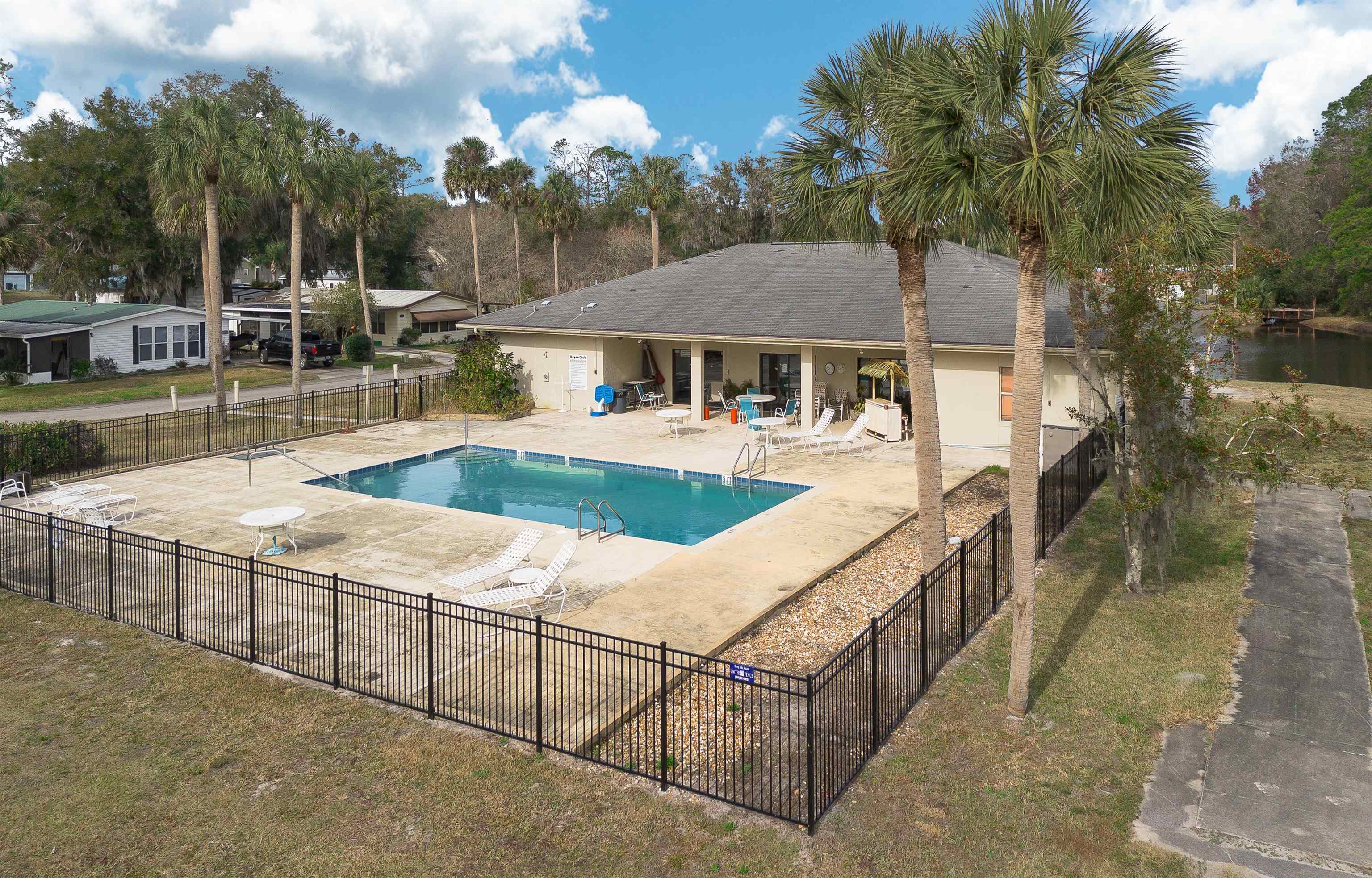 102 Pinelake Drive Satsuma, FL 32189 - Photo 26 of 35 a view of a house with backyard and sitting area