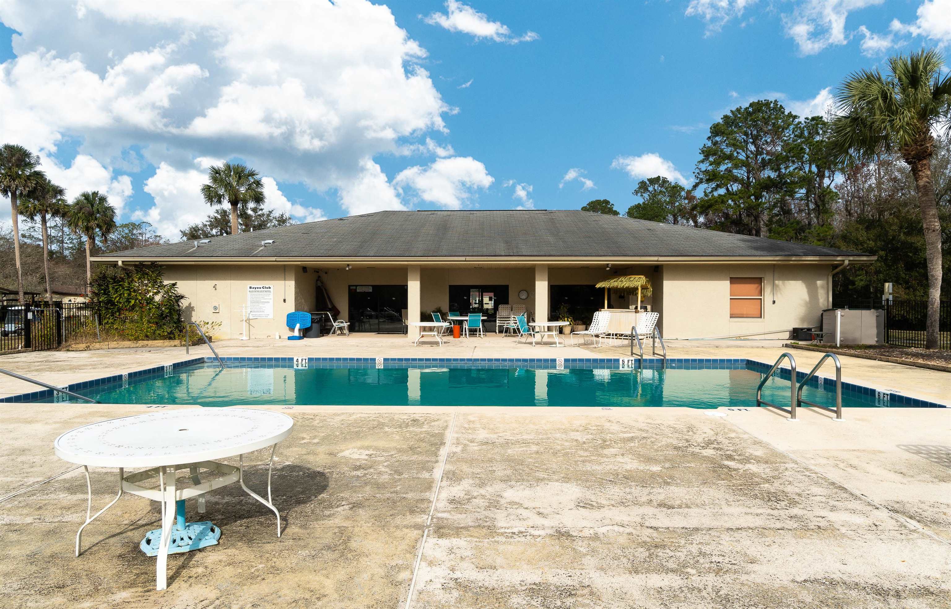 102 Pinelake Drive Satsuma, FL 32189 - Photo 27 of 35 a view of house with a big yard and potted plants