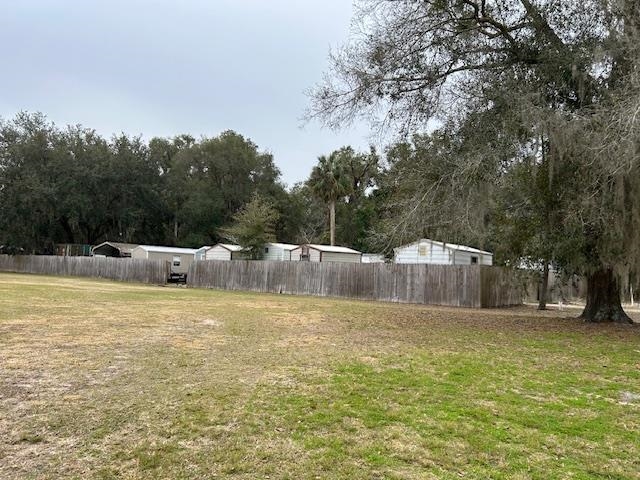 102 Pinelake Drive Satsuma, FL 32189 - Photo 32 of 35 a view of swimming pool with a yard