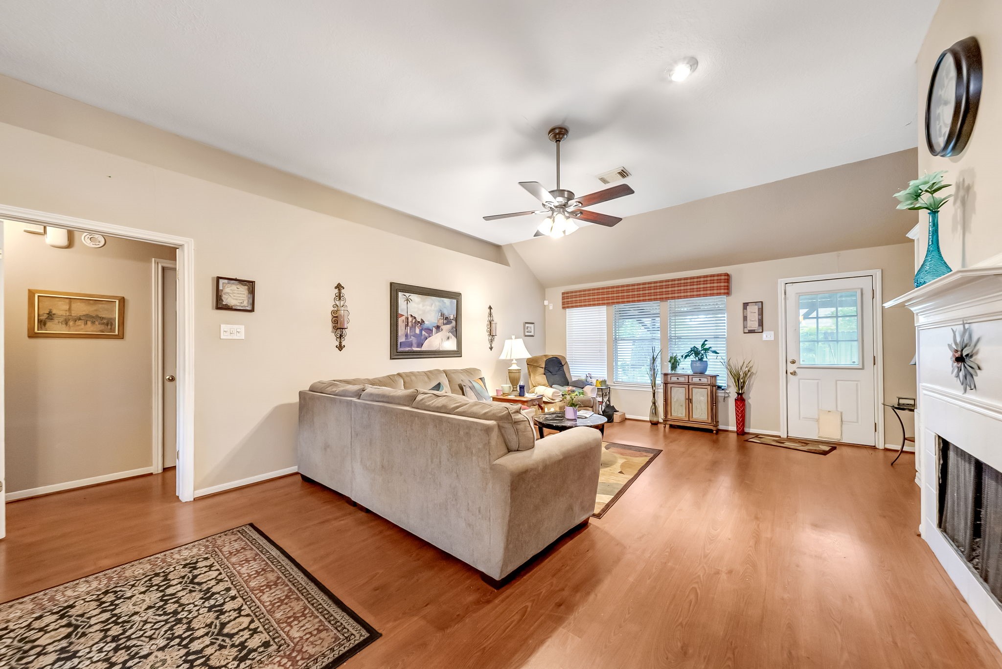 22906 Prairie Bird Lane Spring, TX 77373 - Photo 9 of 14 a living room with furniture and a rug