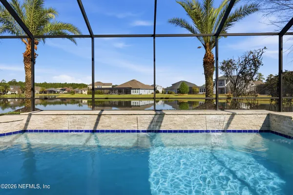 a view of a house with garden and yard