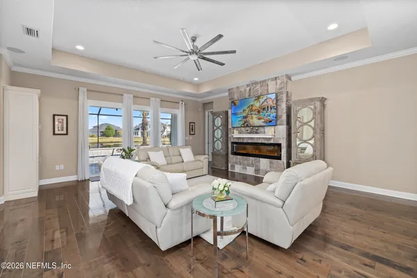 a view of a lake with houses in the back