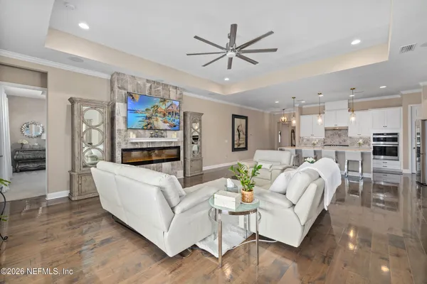 a front view of a house with a lake view