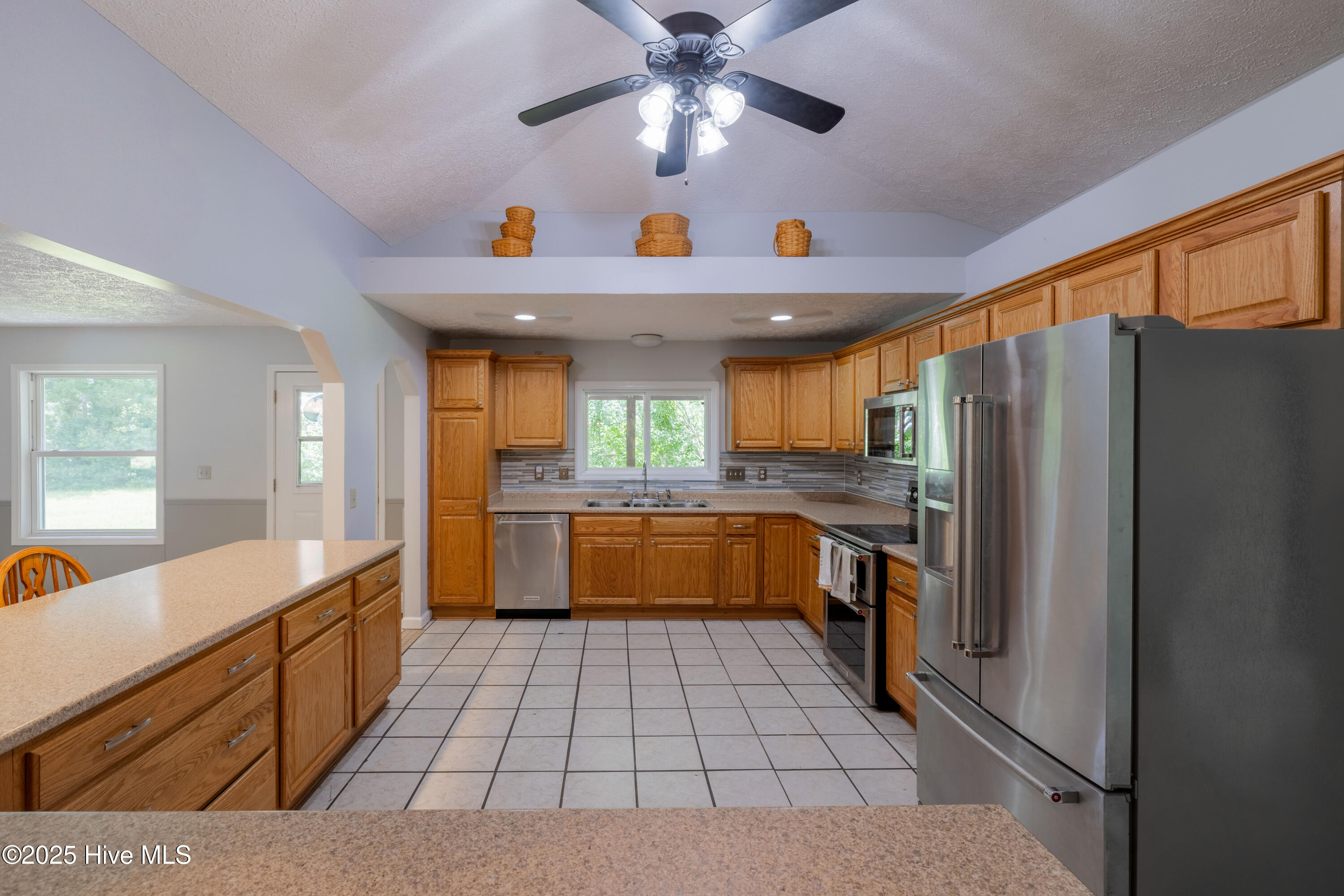 161 Howard Lane Swansboro, NC 28584 - Photo 10 of 56 Huge kitchen with room for 8 to eat along outer counter with 10" overhang.