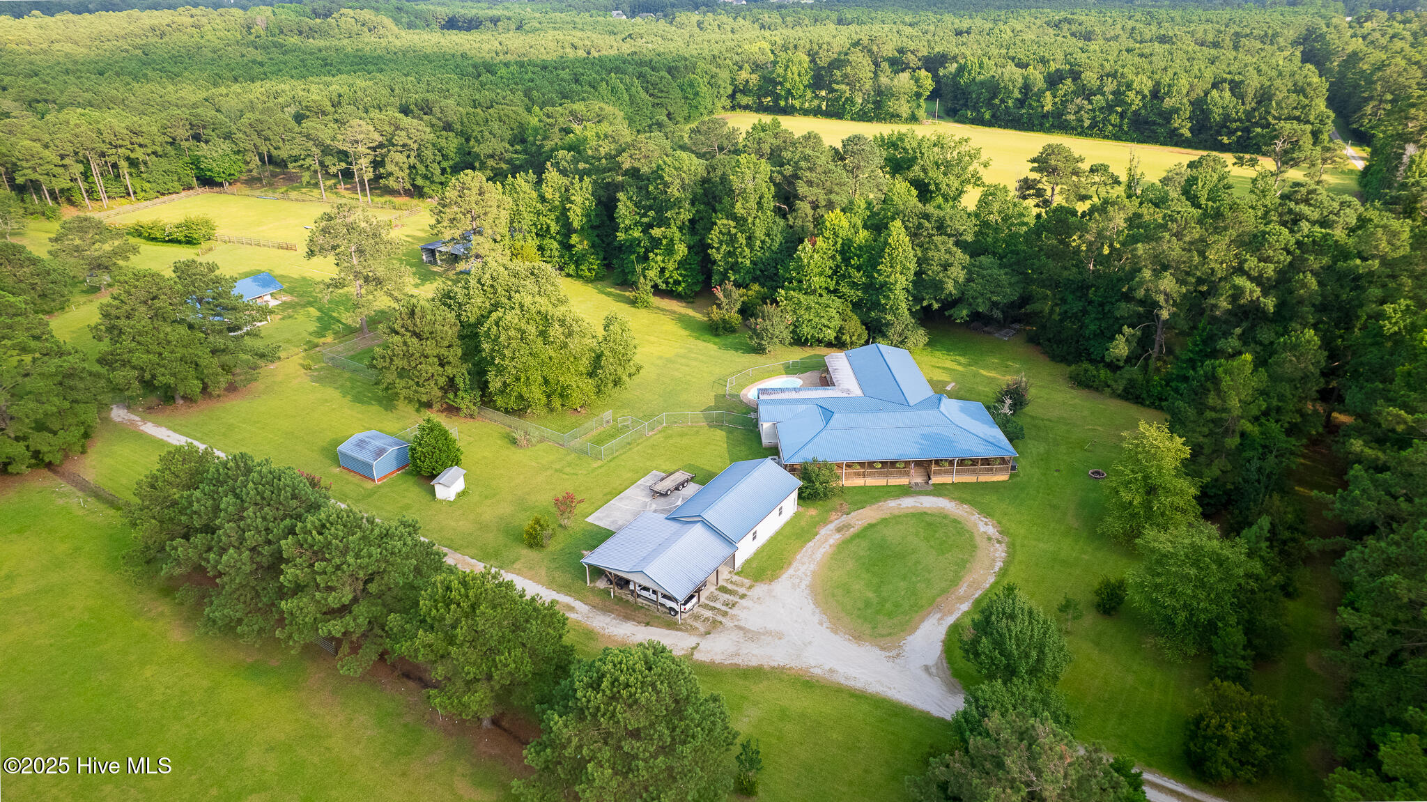 161 Howard Lane Swansboro, NC 28584 - Photo 27 of 56 The residence is near the entrance to the 28+ acres. The treeline and "end of lane" location offers the kind of privacy that makes curtains superfluous.